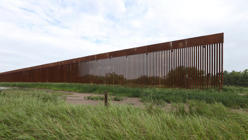 FILE - A border wall section stands on July 14, 2021, near La Grulla, Texas, in Starr County....