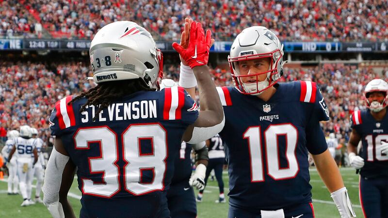 New England Patriots running back Rhamondre Stevenson (38) celebrates his touchdown with...