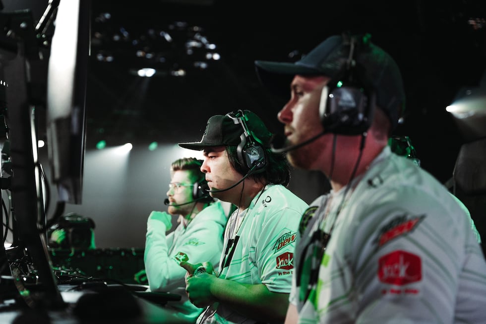 From left, Lucid, FormaL, and Trippy of OpTic Gaming prepare for a match on the main stage of...