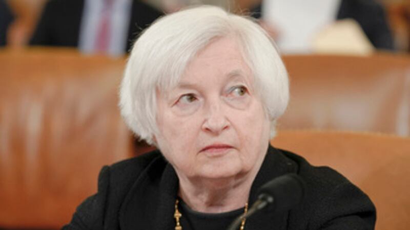 Treasury Secretary Janet Yellen listens as she testifies during a House Ways and Means...