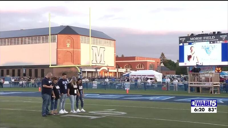 Maine football vigil for Minor on anniversary of death